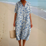Magnolia - Ivory Dress Adorned with Porcelain Blue Floral Accents